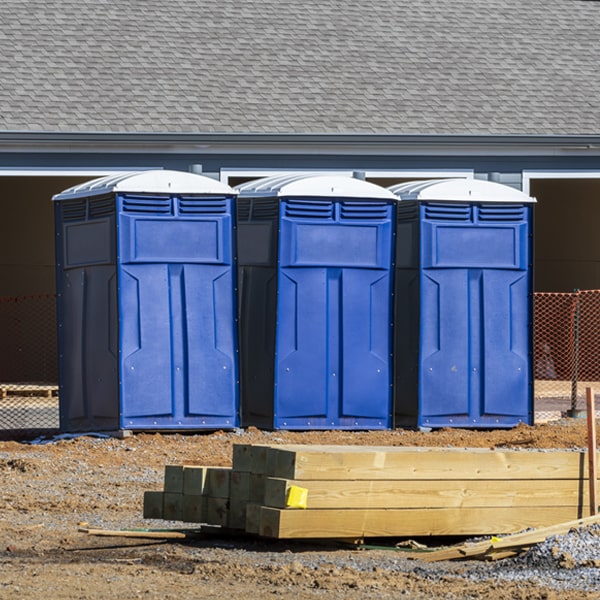 how often are the porta potties cleaned and serviced during a rental period in Walker